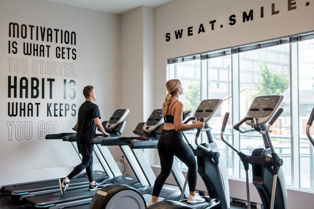 Treadmills and ellipticals in the main floor gym