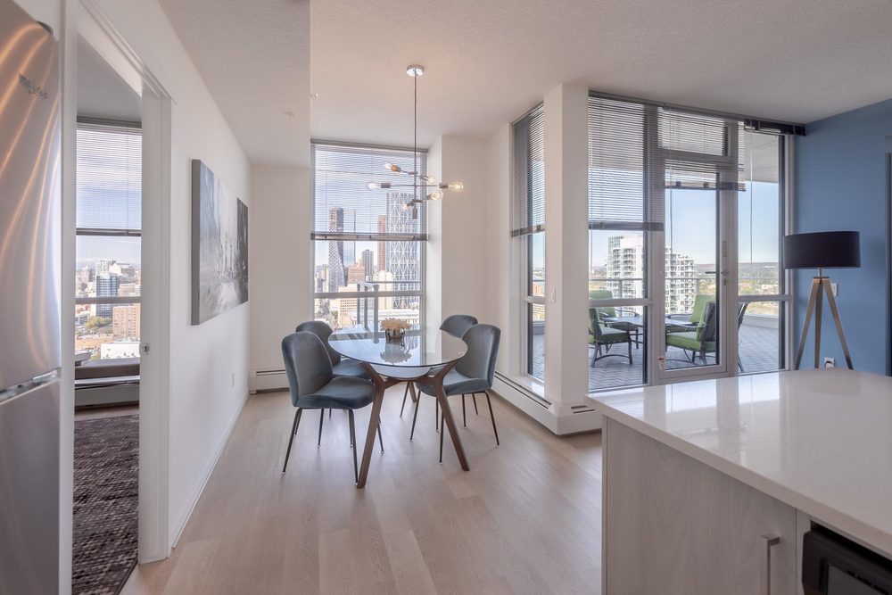 Dining area beside a corner window