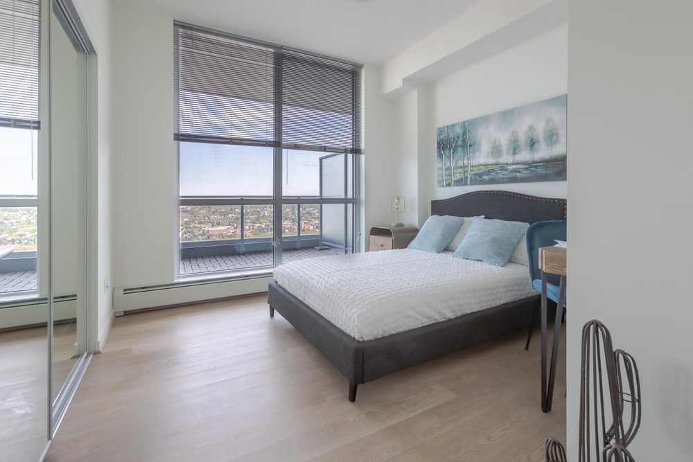 Bedroom with a mirrored closet