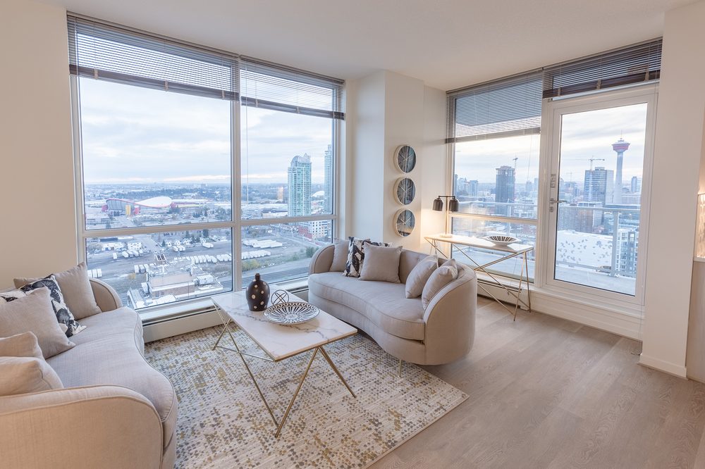 Living room with two sofas and a view of downtown