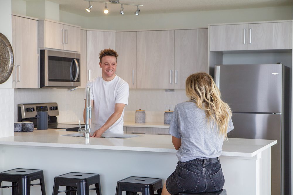 Making breakfast at the kitchen island
