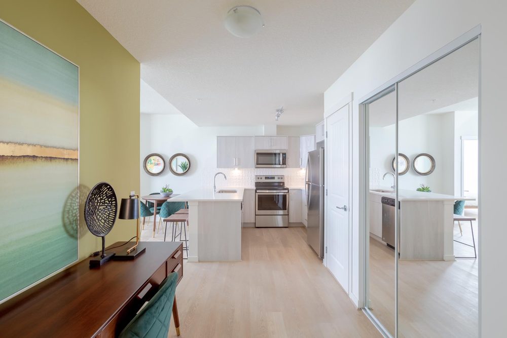 Kitchen and entry with mirrored closet